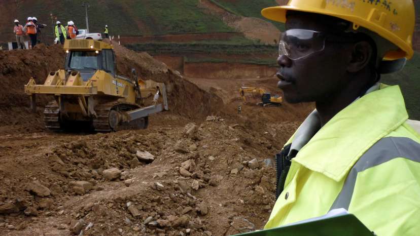 FILE PHOTO: An employee stands in an open pit at Twangiza mine in eastern Congo