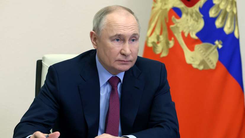 Russian President Putin takes part in a ceremony outside Moscow