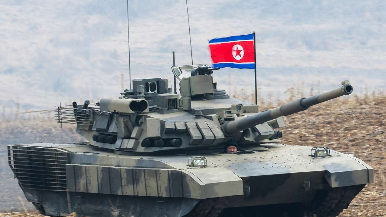 North Korean leader Kim Jong Un guides a military demonstration involving tank units