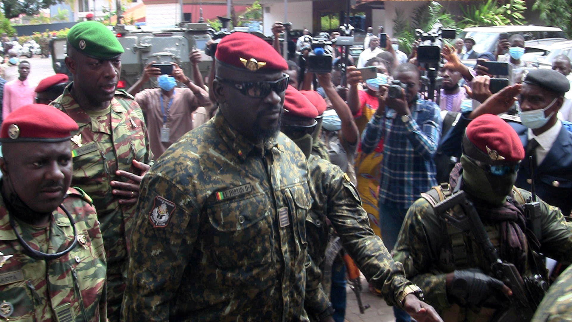 FILE PHOTO: Special forces commander Mamady Doumbouya, who ousted President Conde, walks out after meeting the envoys from ECOWAS about the Guinea crisis to discuss ways steer the country back toward a constitutional