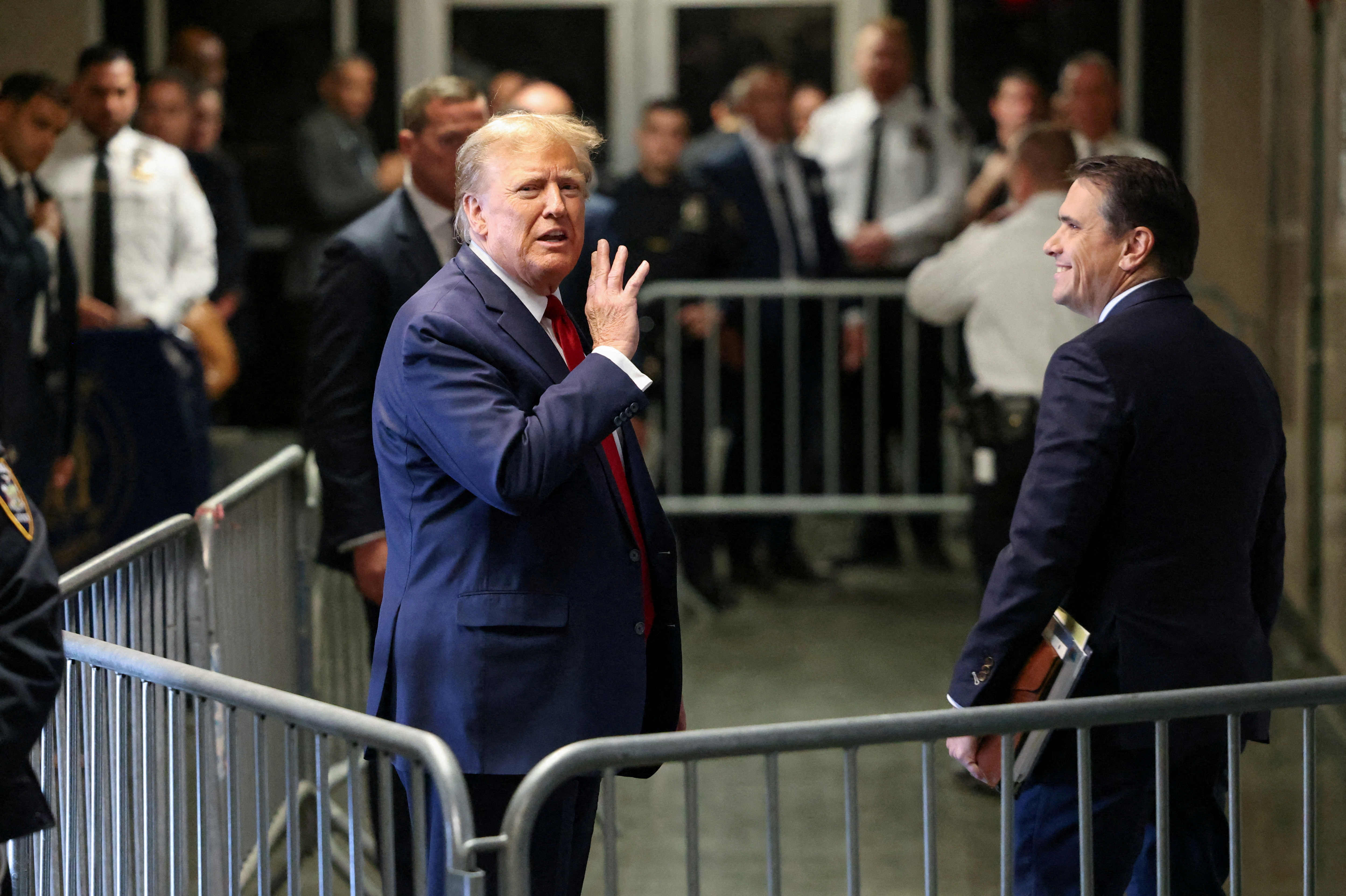 FILE PHOTO: Former U.S. President Trump attends a hearing on a criminal case linked to a hush money payment, in New York City