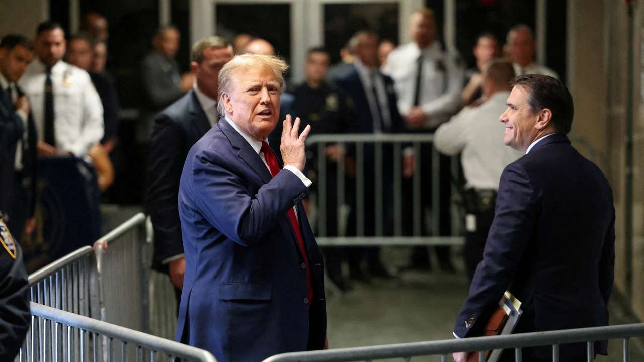 FILE PHOTO: Former U.S. President Trump attends a hearing on a criminal case linked to a hush money payment, in New York City