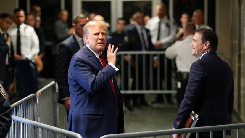 FILE PHOTO: Former U.S. President Trump attends a hearing on a criminal case linked to a hush money payment, in New York City