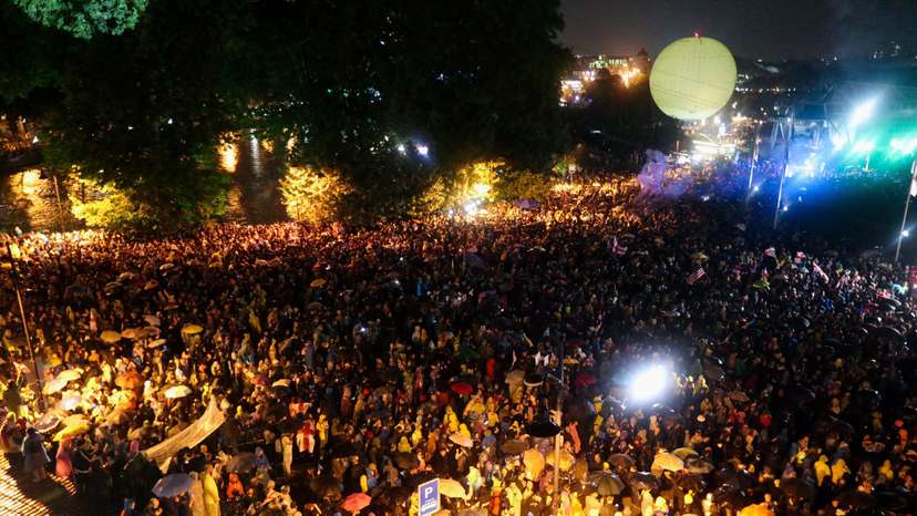 Demonstrators hold a rally to protest against a bill on "foreign agents" in Tbilisi