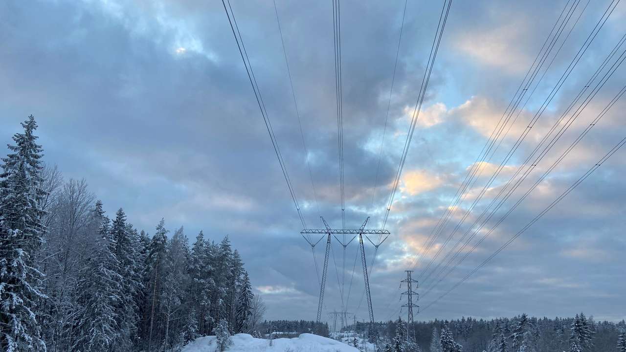 FILE PHOTO: Powerlines are pictured in snowy Espoo