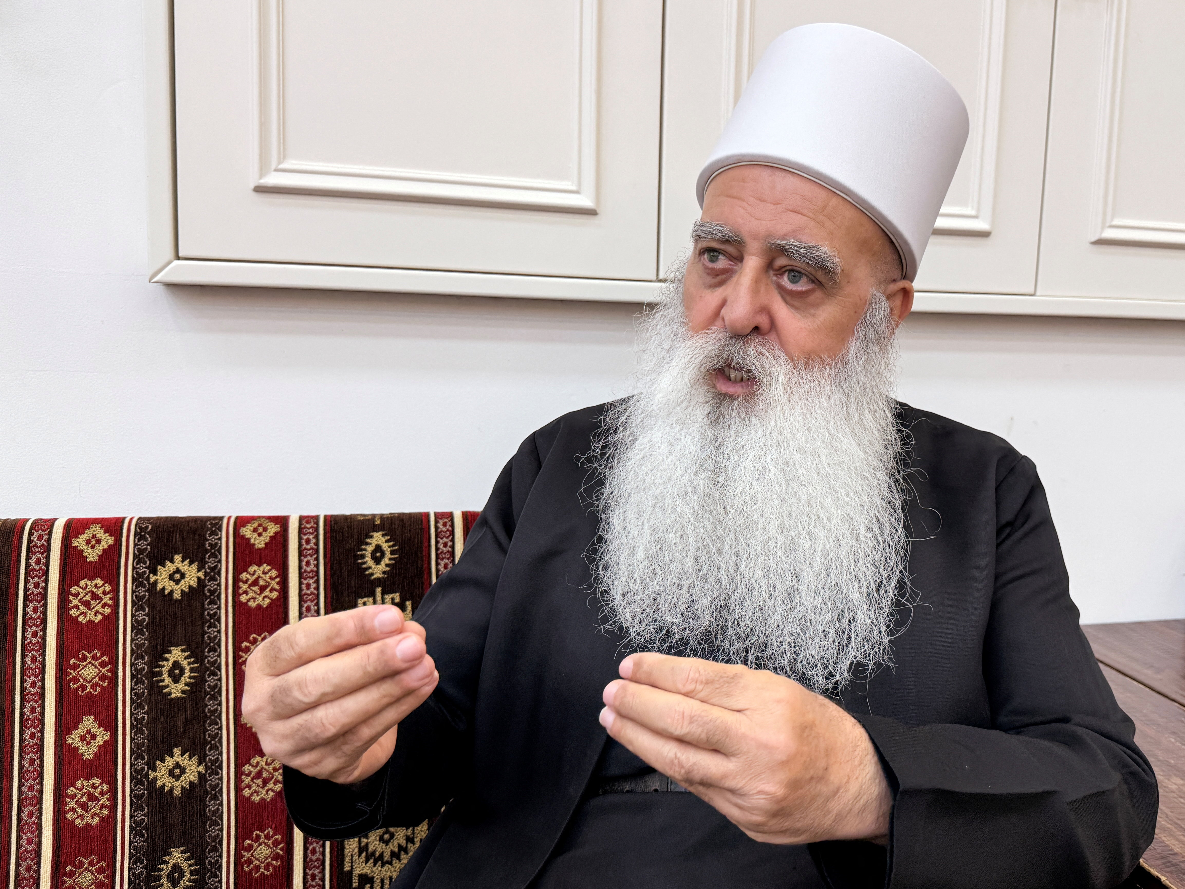 Leader of the Druze community in Israel Sheikh Mowafaq Tarif speaks with Reuters at his house in Julis