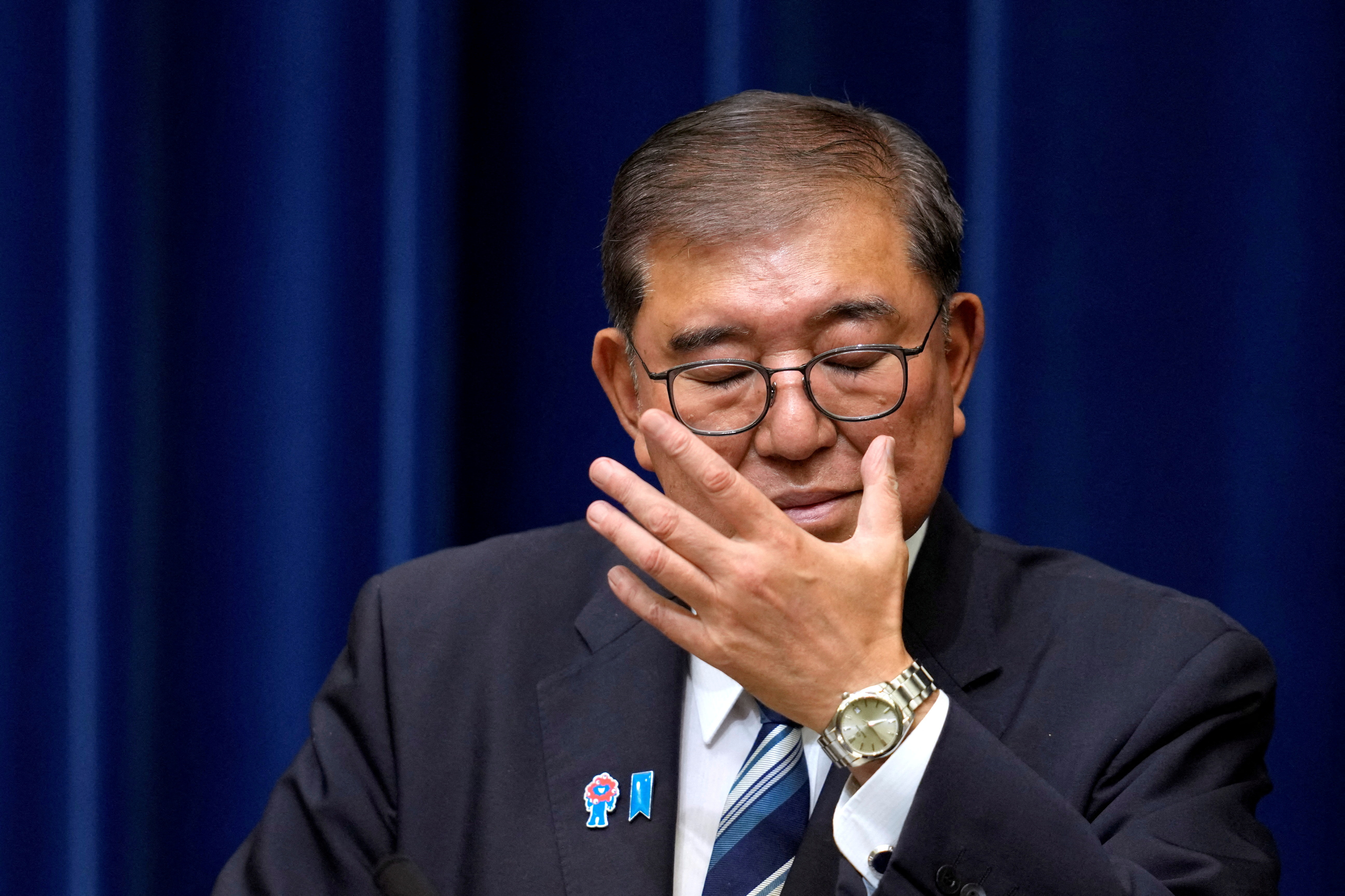 FILE PHOTO: Japanese Prime Minister Shigeru Ishiba attends a press conference as he announces his resignation, in Tokyo