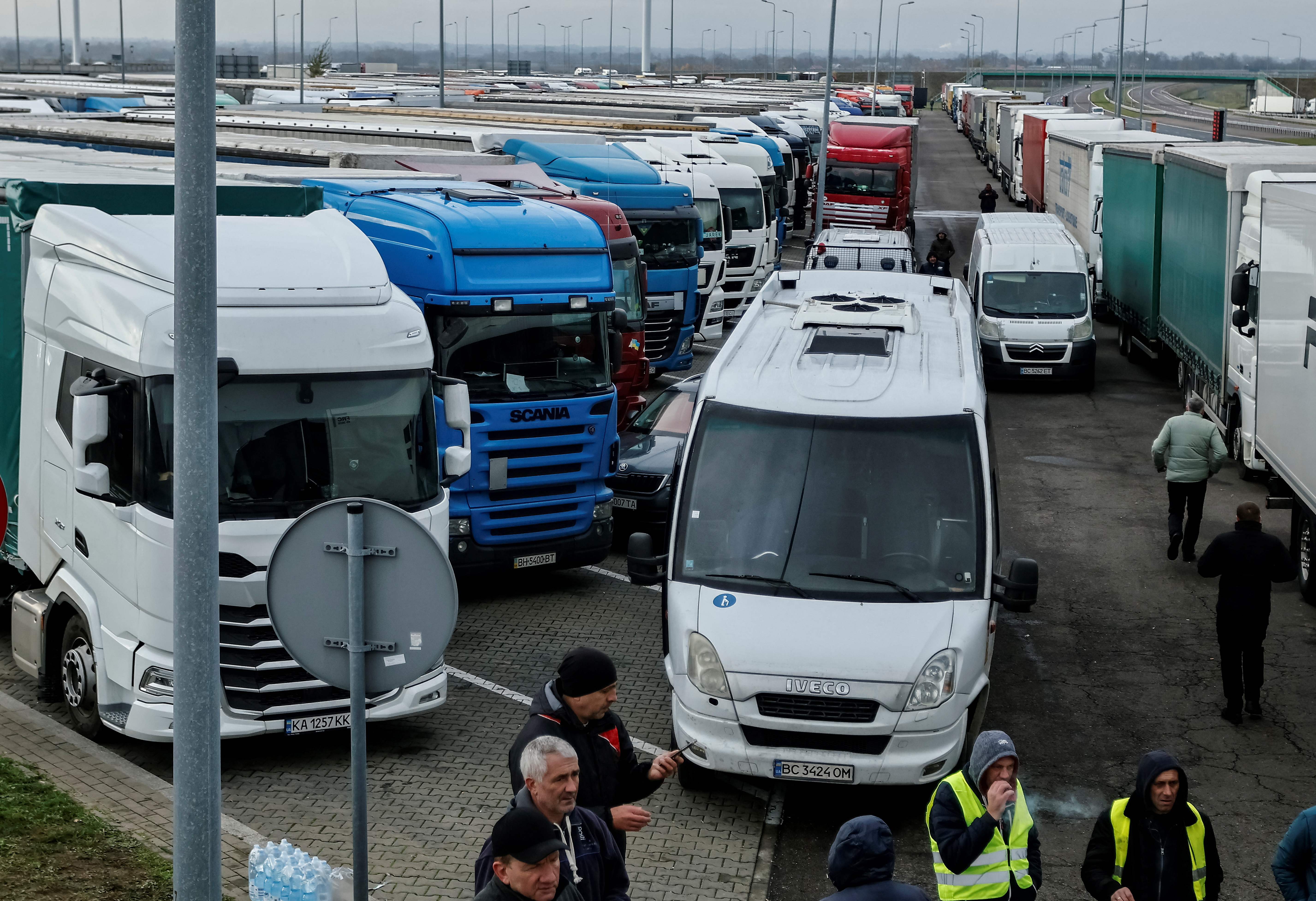 Ukrainian trucks are parked near the Poland-Ukraine border, near the village of Korczowa