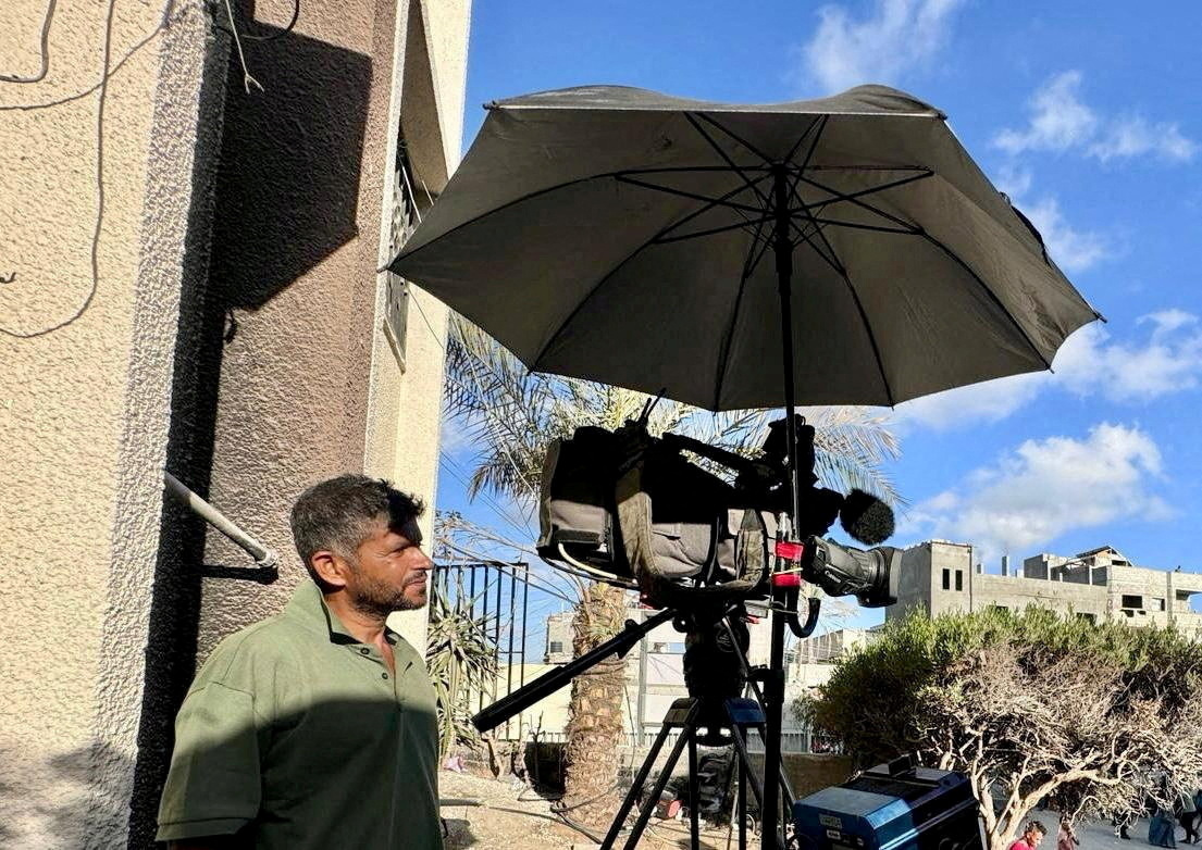 FILE PHOTO: Palestinian cameraman and Reuters journalist Hussam al-Masri