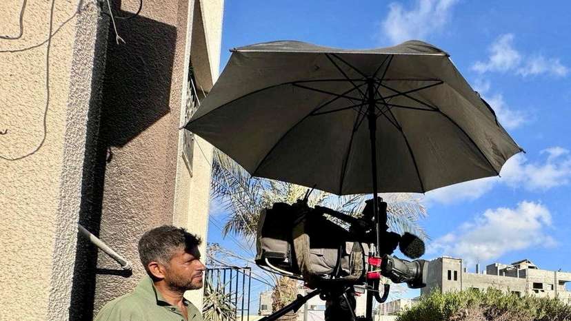 FILE PHOTO: Palestinian cameraman and Reuters journalist Hussam al-Masri