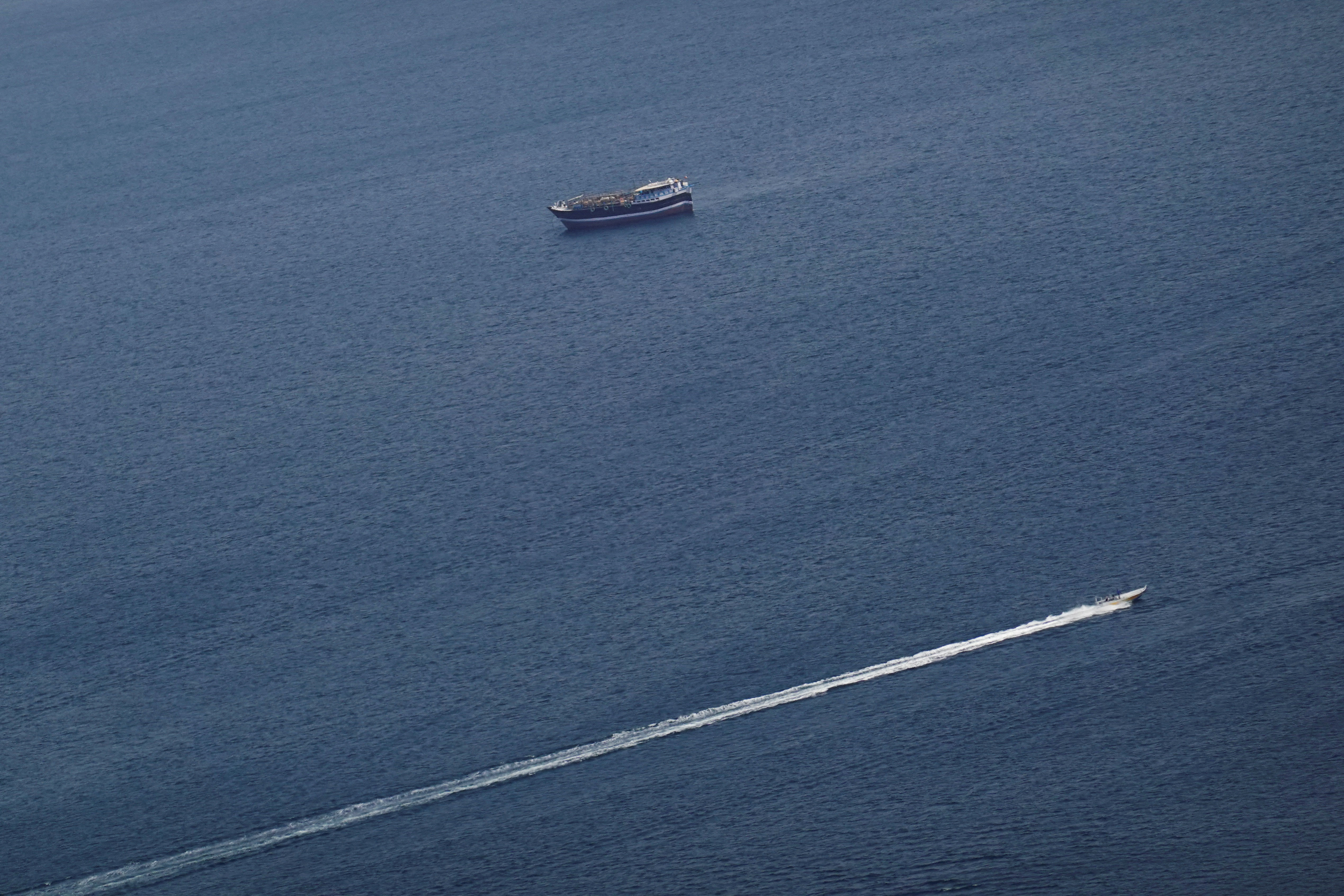 Boats in the Strait of Hormuz amid the U.S.-Israeli conflict with Iran, as seen from Musandam