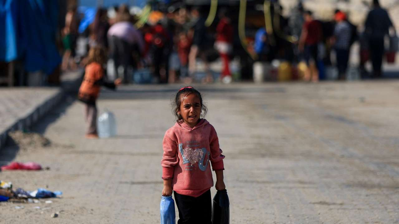 Palestinians gather to collect water, Gaza City