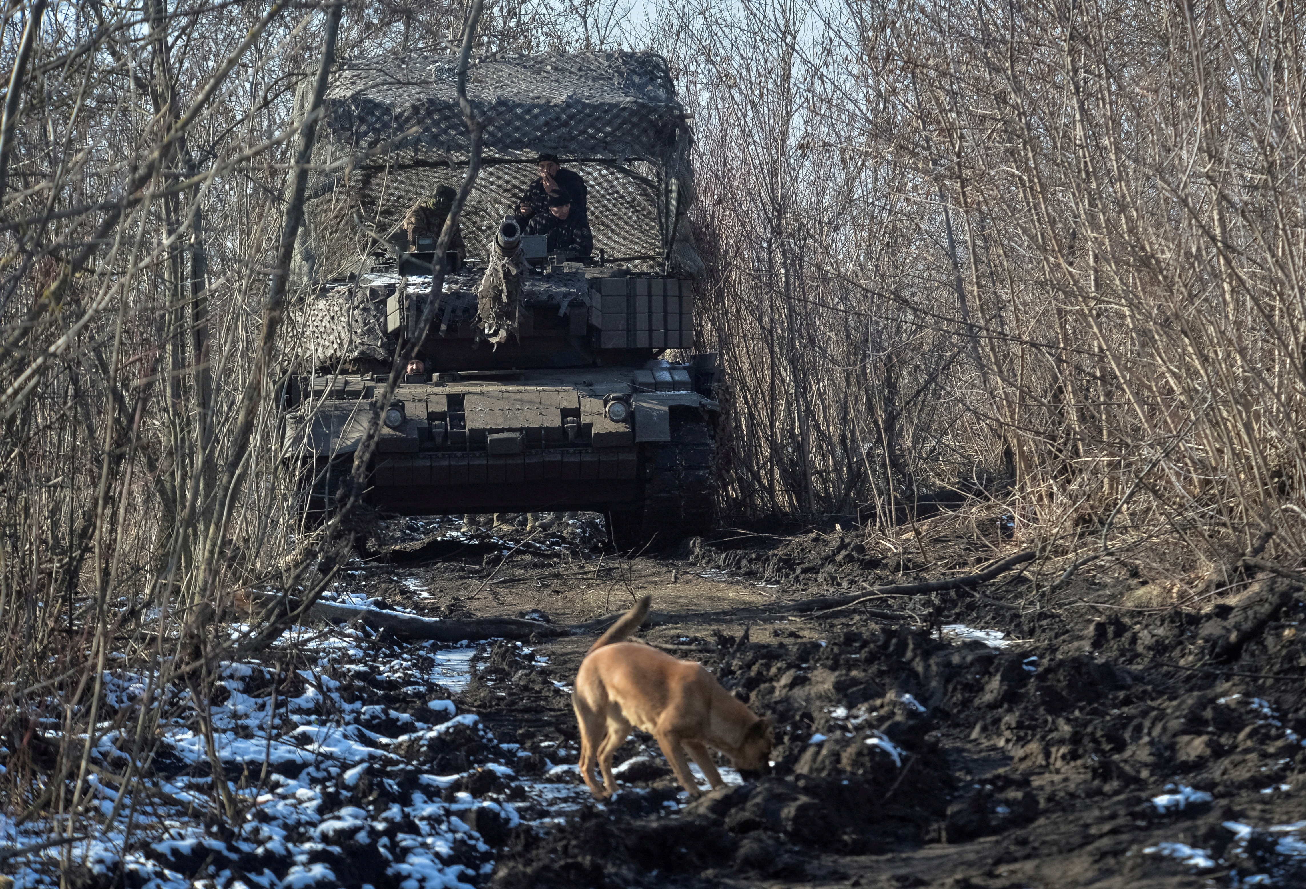 FILE PHOTO: FILE PHOTO: Ukrainian servicemen drive in a Leopard 1A5 tank in Donetsk region