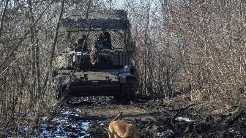 FILE PHOTO: FILE PHOTO: Ukrainian servicemen drive in a Leopard 1A5 tank in Donetsk region
