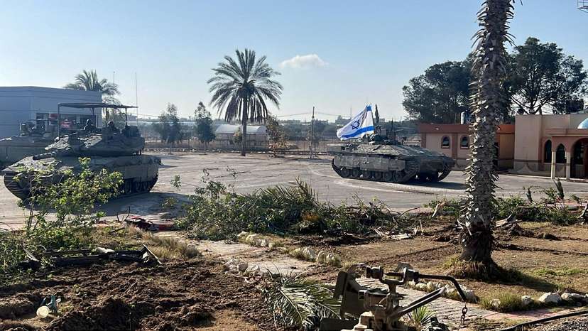 FILE PHOTO: Israeli military vehicles operate in the Gazan side of the Rafah Crossing