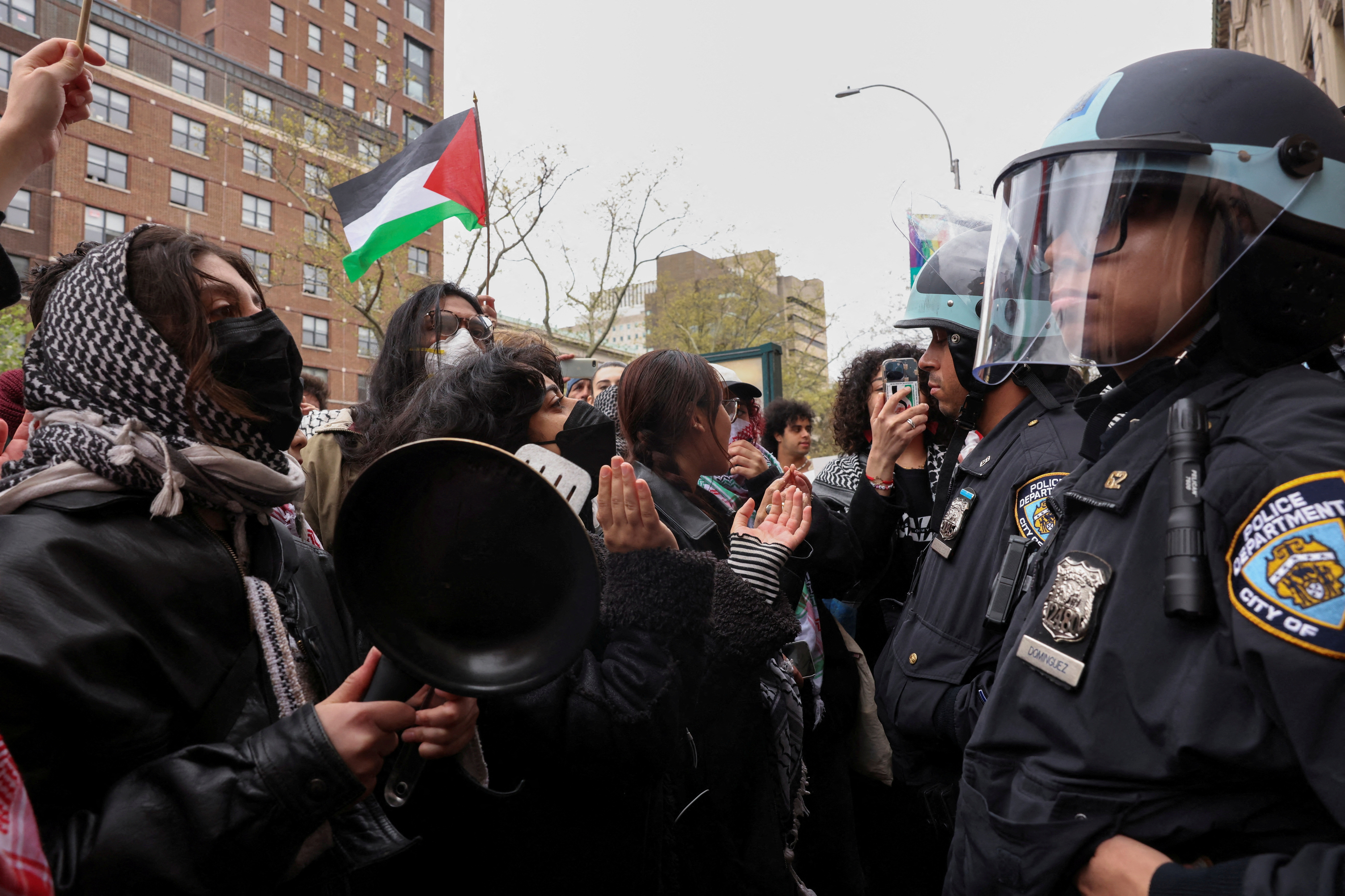 Demonstrators protest in solidarity with Pro-Palestinian organizers on the Columbia University campus, in New York City