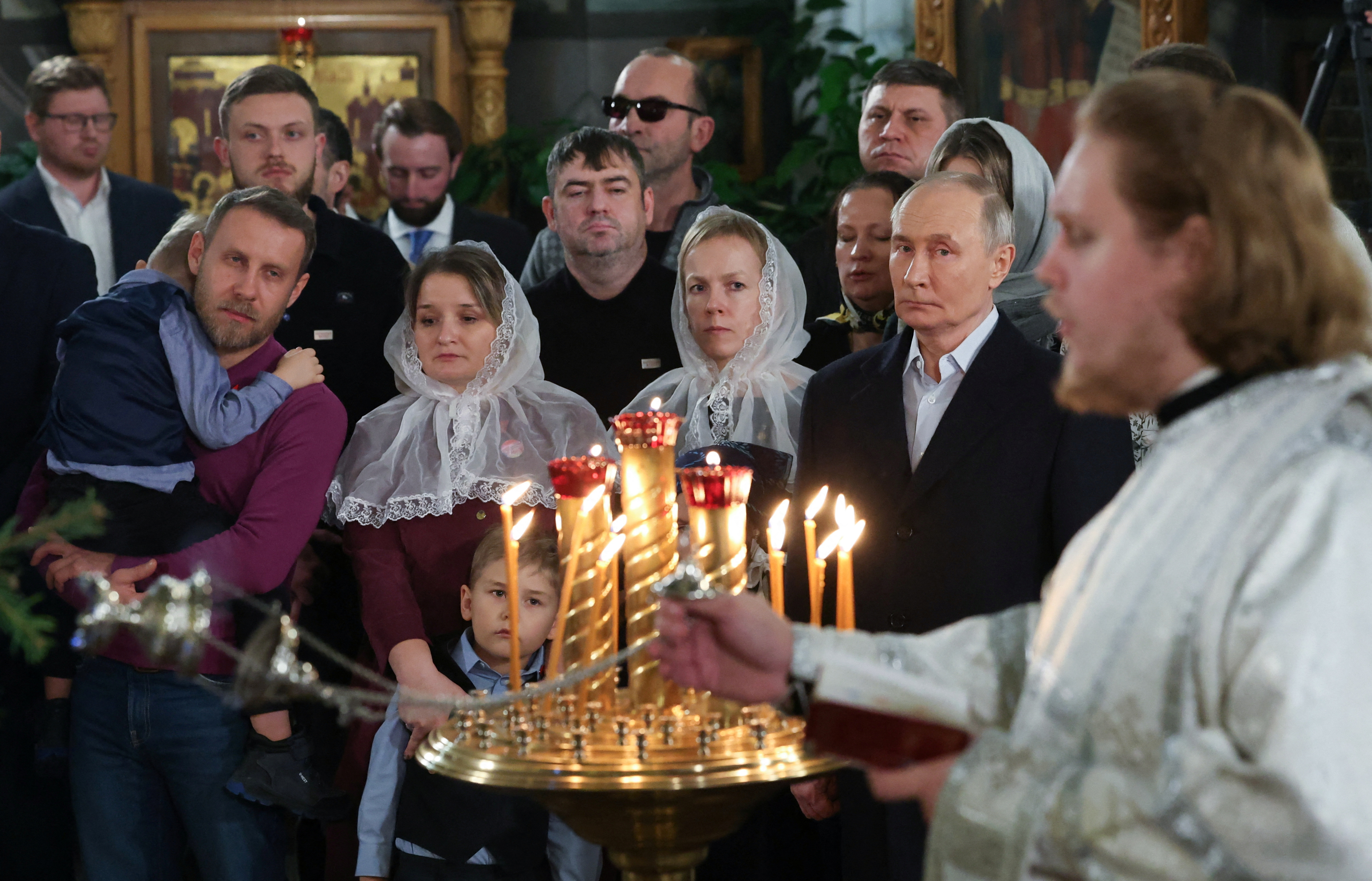 Russia's Putin attends Orthodox Christmas service in Moscow