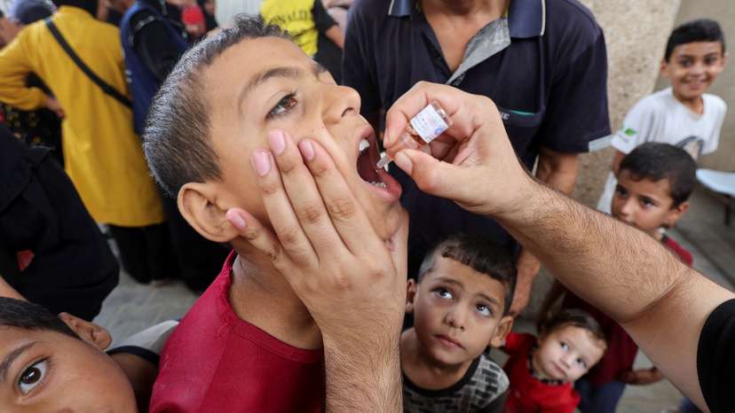 Palestinian children are vaccinated against polio, in Deir Al-Balah in the central Gaza Strip