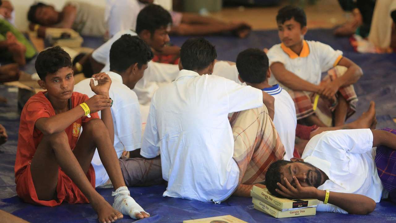 Rohingya refugees rest at the temporary shelter in Suak Nie village following their arrival in the waters of West Aceh