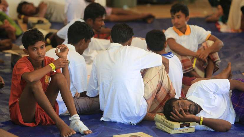 Rohingya refugees rest at the temporary shelter in Suak Nie village following their arrival in the waters of West Aceh