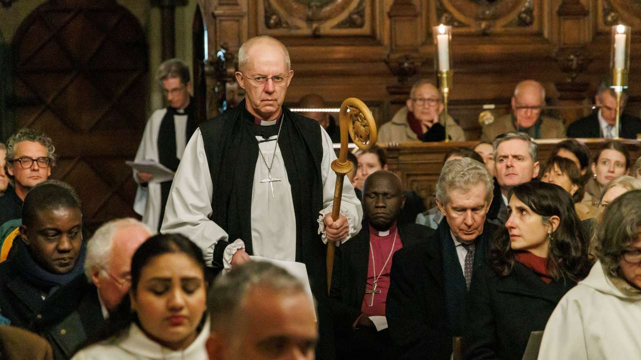 Archbishop of Canterbury Justin Welby lays down his pastoral staff on the altar at the chapel in Lambeth Palace, London