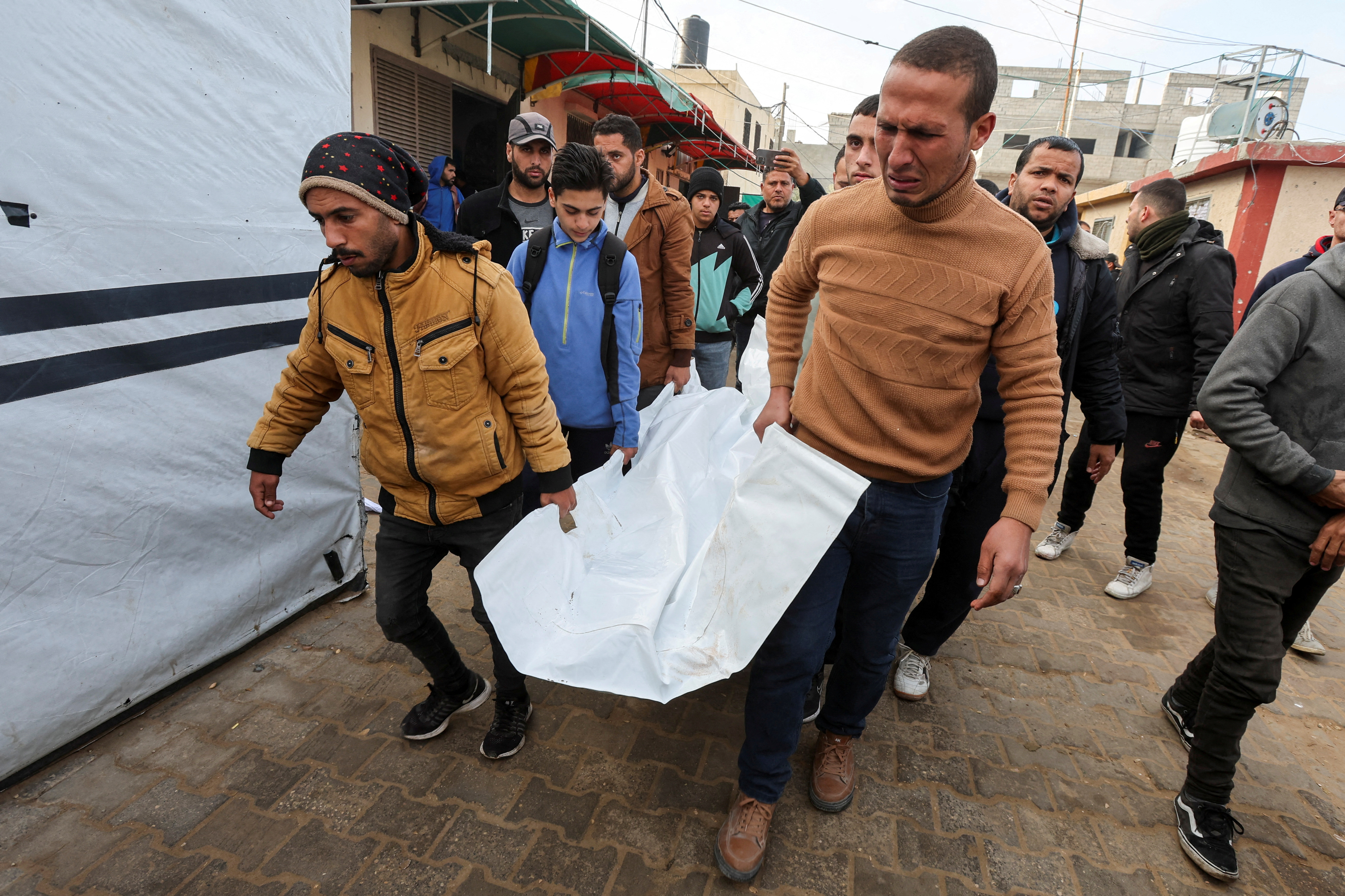 Funeral of Palestinians killed in Israeli strikes, in Deir Al-Balah in the central Gaza Strip