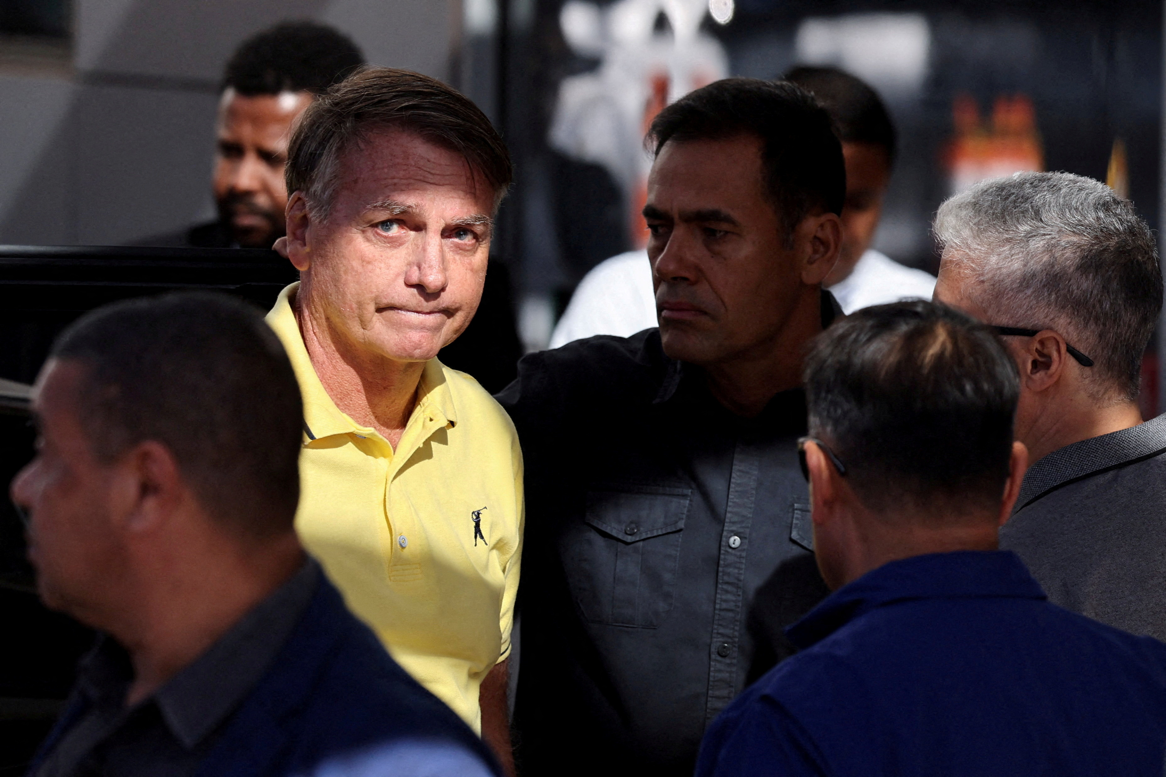 FILE PHOTO: Brazil's former President Bolsonaro is seen arriving at a hospital in Brasilia