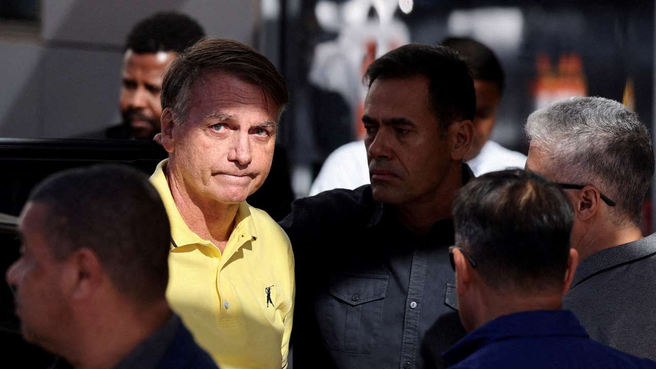 FILE PHOTO: Brazil's former President Jair Bolsonaro arrives at a hospital for medical examinations, authorized by Supreme Court Justice Alexandre de Moraes, leaving the house arrest as he awaits trial after being accused of plotting a coup following his electoral defeat, in Brasilia, Brazil, August 16, 2025. REUTERS/Adriano Machado/File Photo