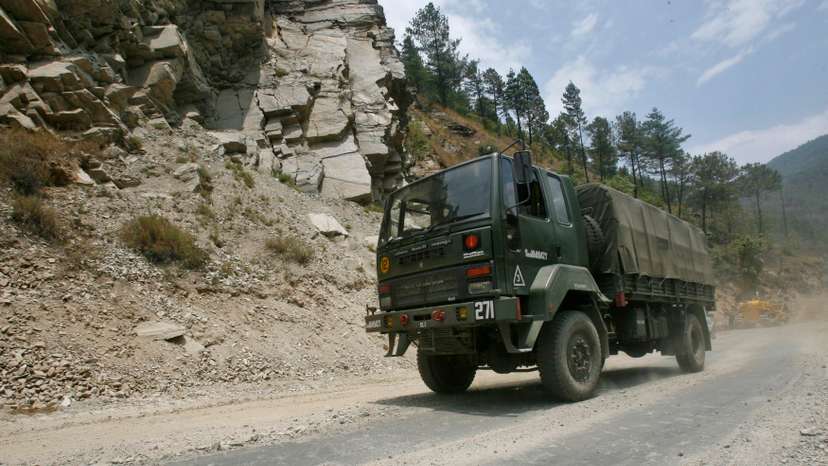 An Indian army truck drives along India's Tezpur-Tawang highway, which runs to the Chinese border, in the northeastern Indian state of Arunachal Pradesh