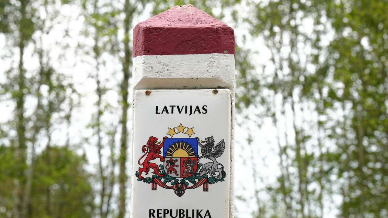 Latvian border sign is seen at Latvia-Belarus border near Robeznieki