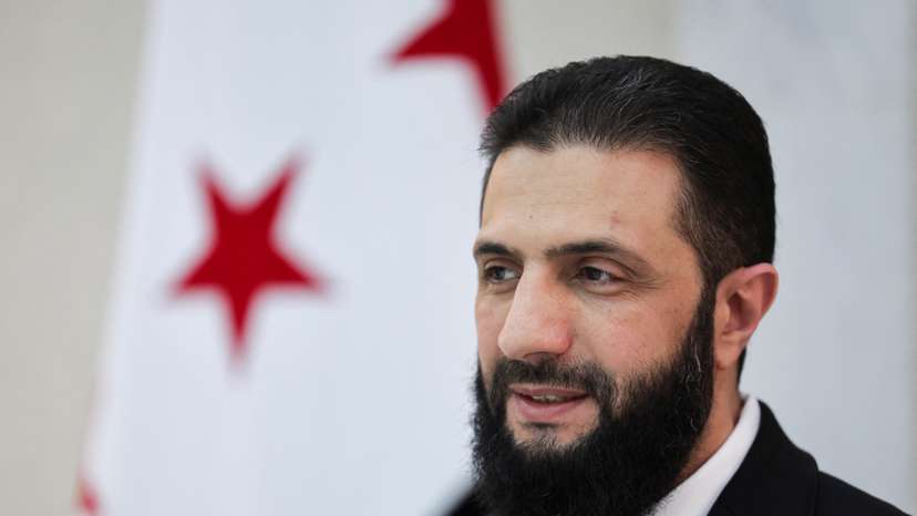 Syria’s interim President Ahmed al-Sharaa attends an interview with Reuters