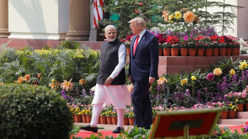 FILE PHOTO: U.S. President Donald Trump and India's Prime Minister Narendra Modi arrive for their joint news conference at Hyderabad House in New Delhi