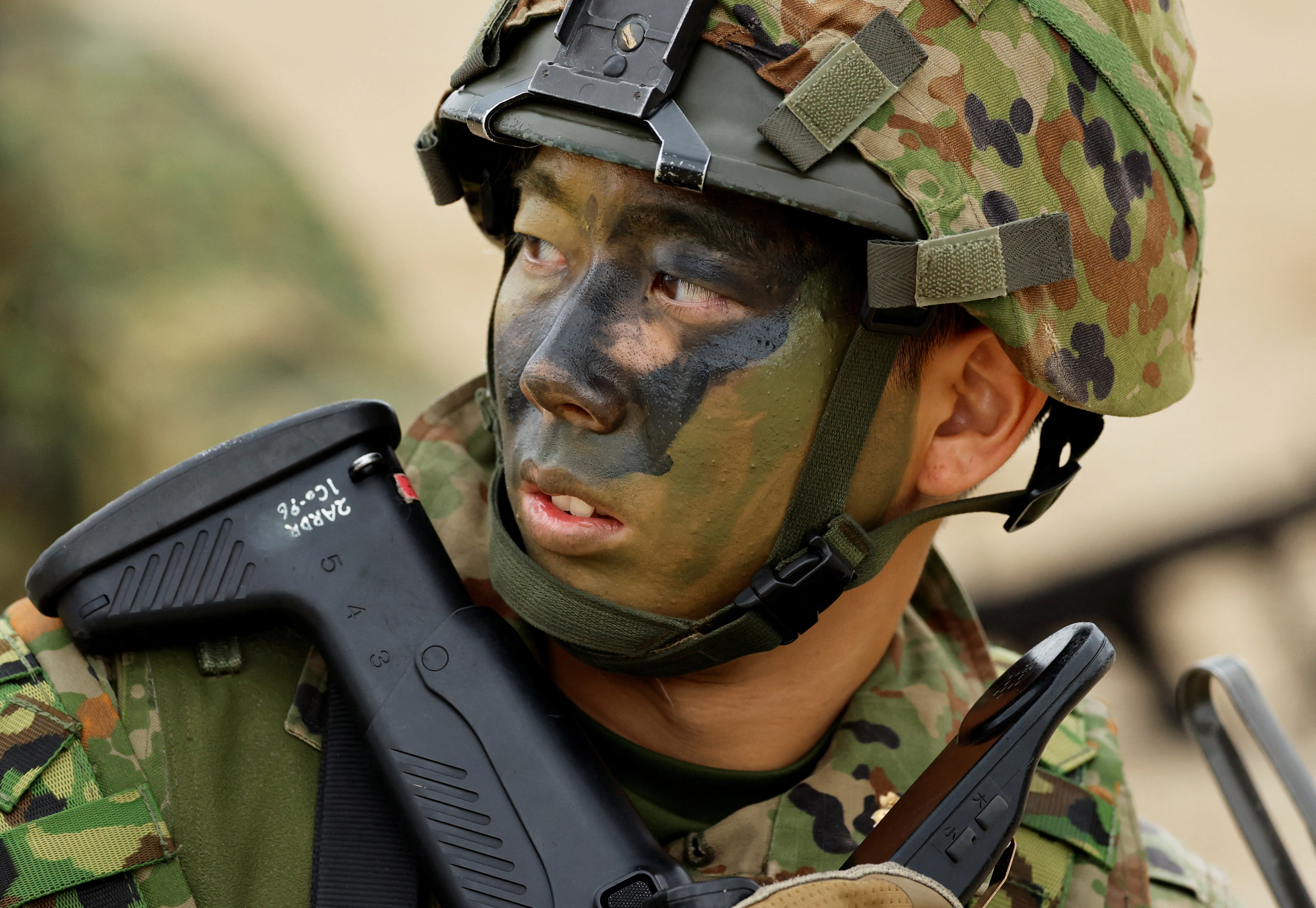 Soldiers of Japanese Ground Self-Defense Force's ARDB hold marine landing drill at Tokunoshima island