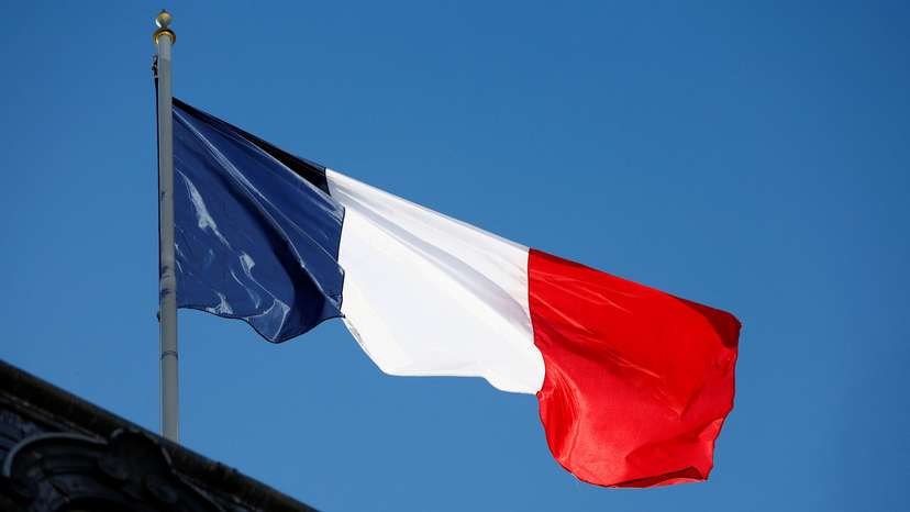 A French flag at the Elysee Palace in Paris