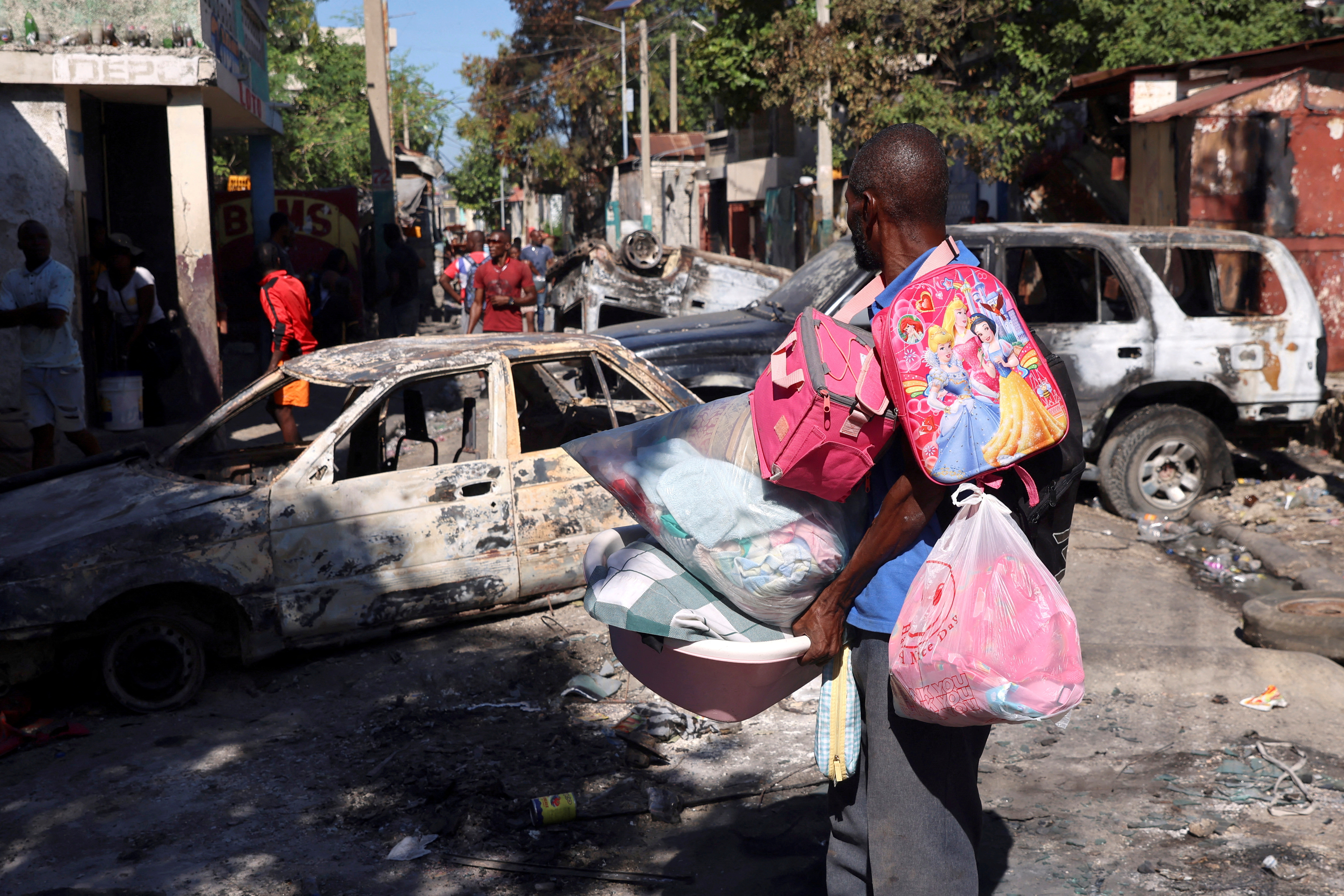 Haitians flee homes due to the gang violence, in Port-au-Prince