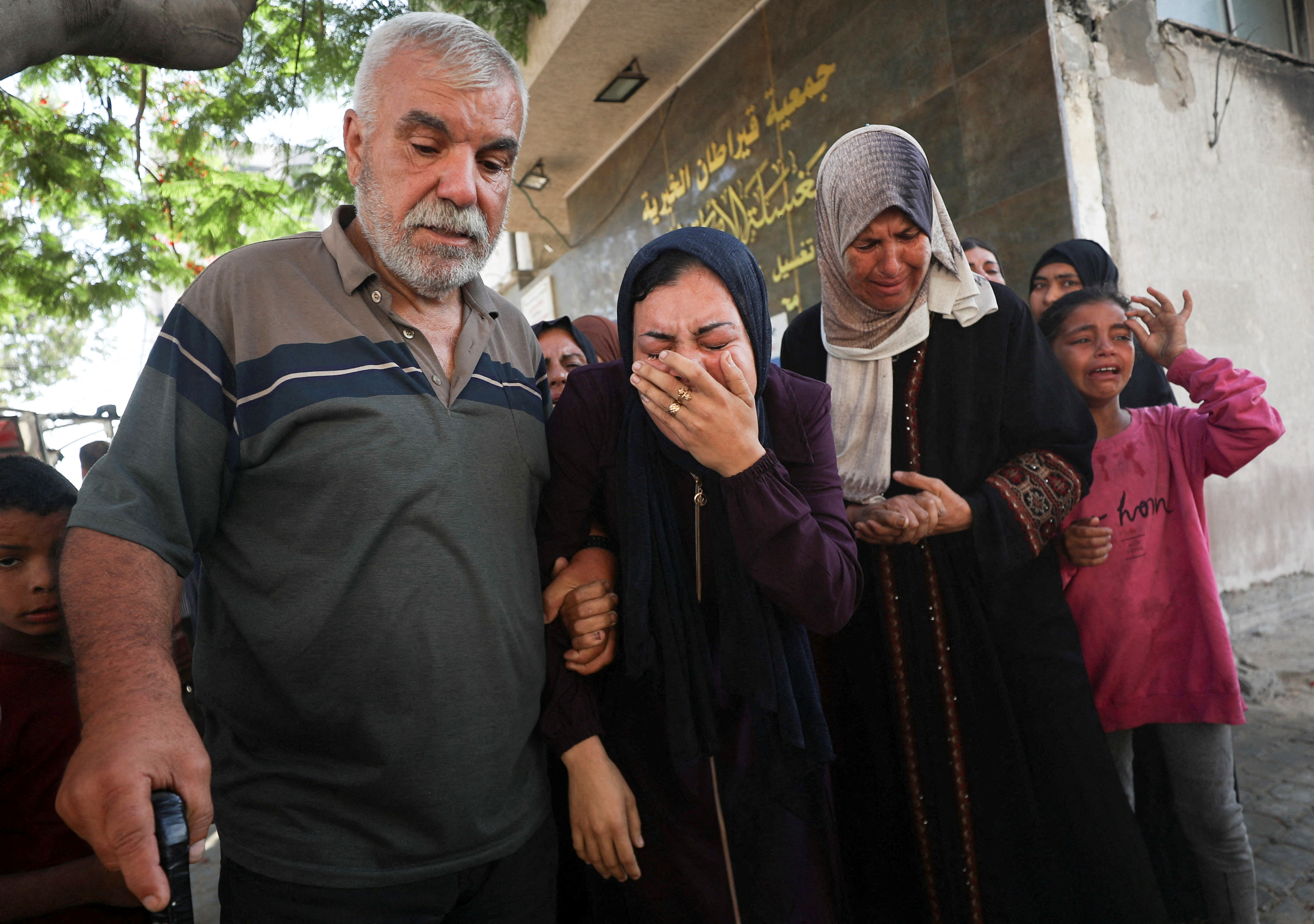 Funeral of Palestinians who were killed by Israeli fire while trying to receive aid in central Gaza Strip, according to the Gaza Health Ministry, at Al-Shifa hospital