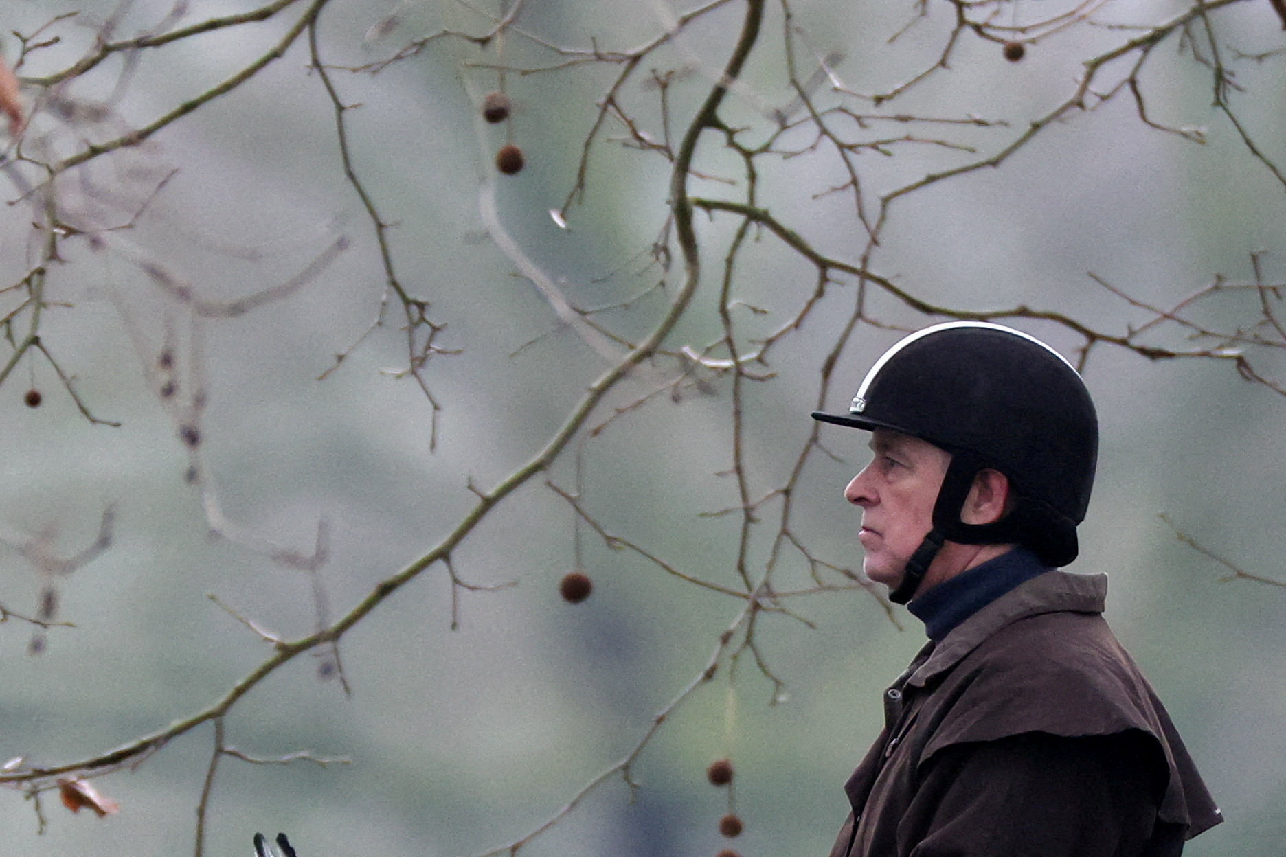 FILE PHOTO: Andrew Mountbatten-Windsor rides a horse in Windsor Great Park
