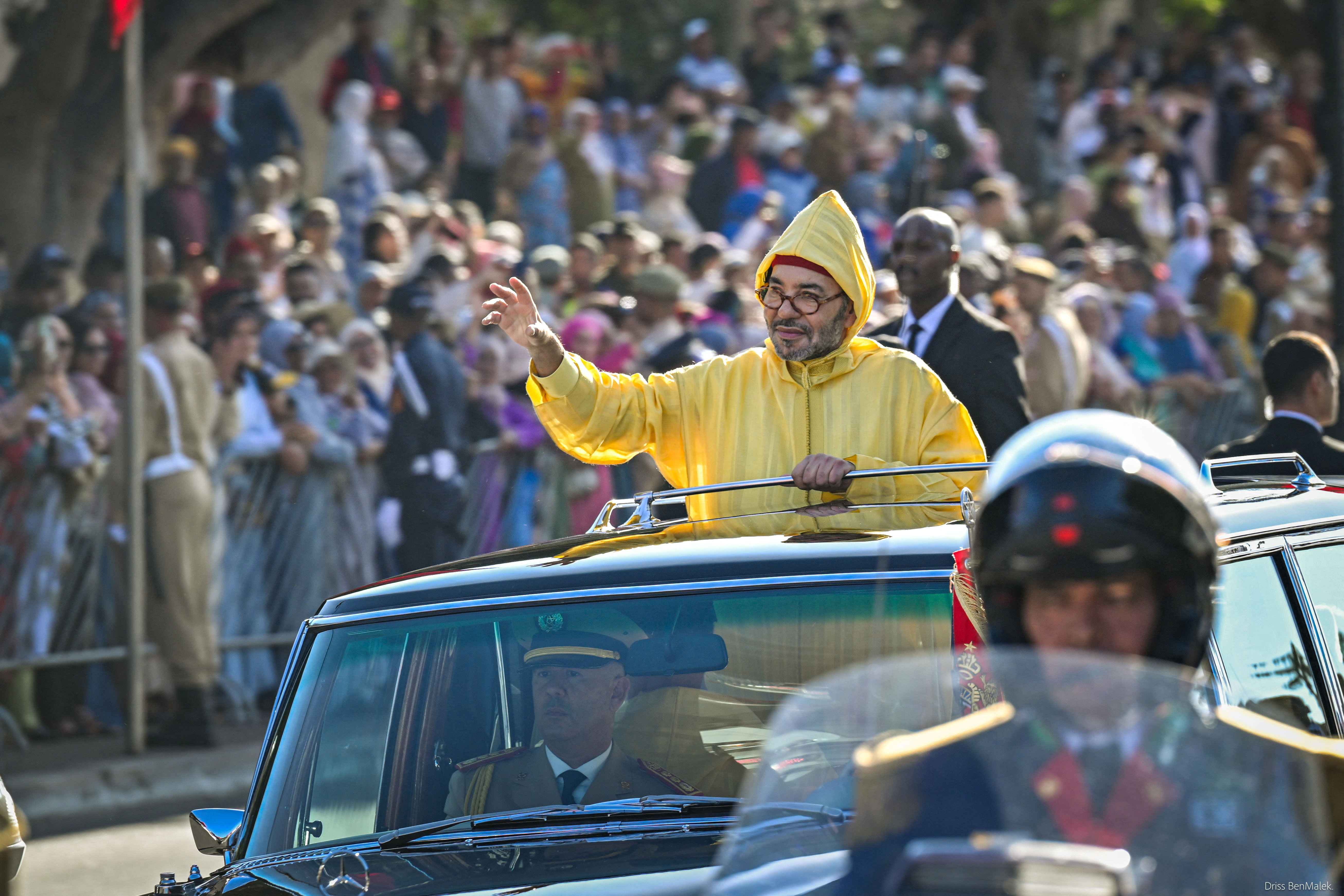 King Mohammed VI greets crowds before he opens Moroccan parliament in Rabat