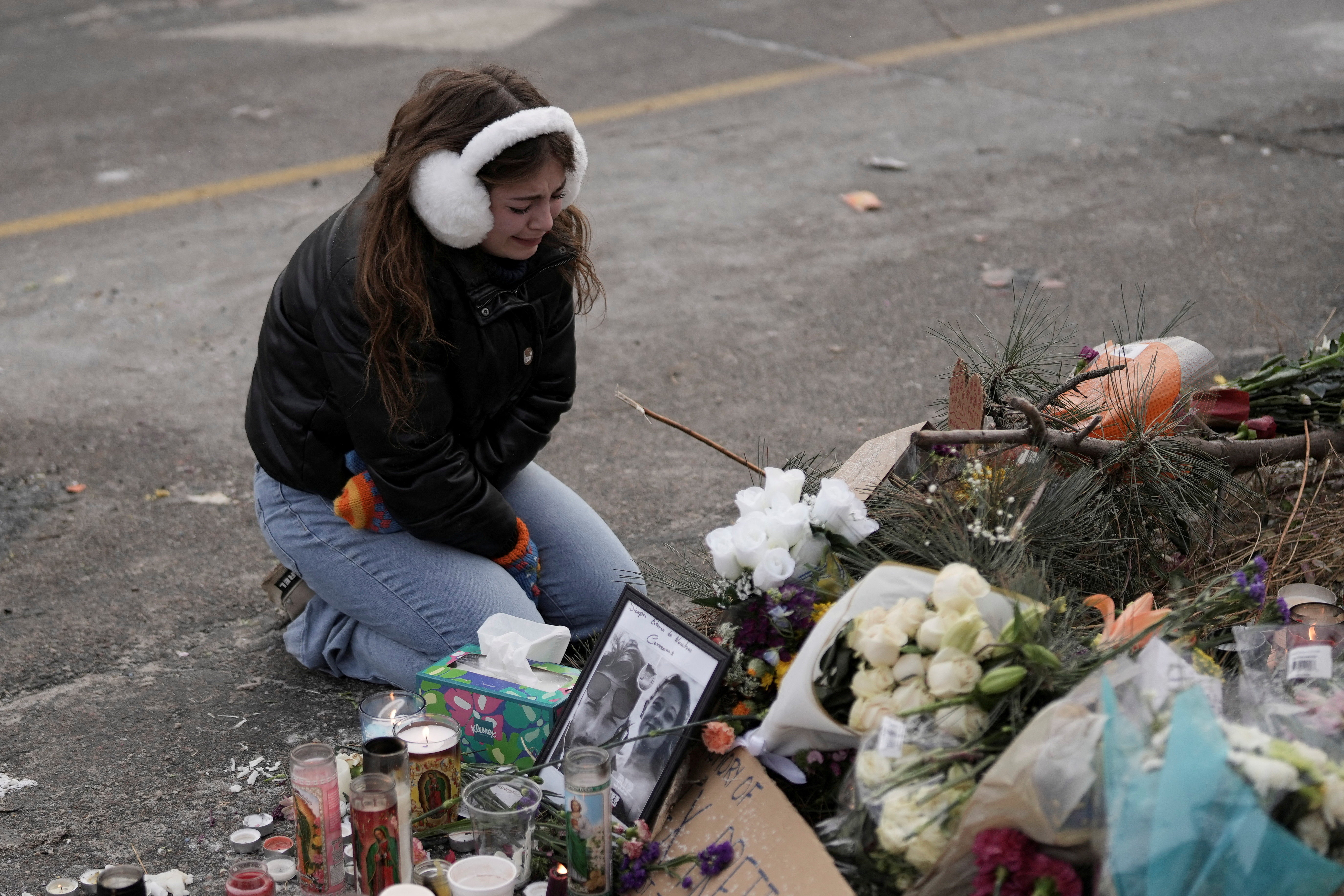 Makeshift memorial at the site where Alex Pretti was fatally shot by federal immigration agents, in Minneapolis