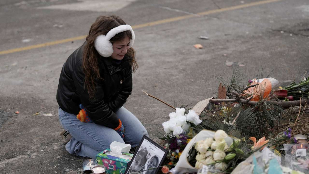 Makeshift memorial at the site where Alex Pretti was fatally shot by federal immigration agents, in Minneapolis