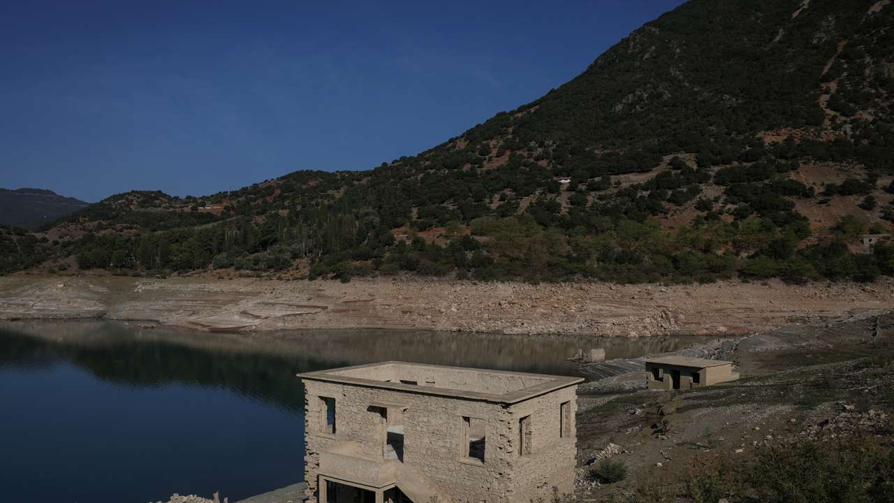 Sunken village emerges in Greece as drought dries up lake