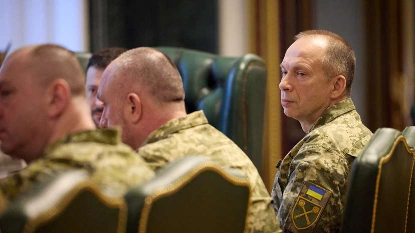 FILE PHOTO: Ukraine's President Zelenskiy attends a meeting with newly appointed top military commanders in Kyiv