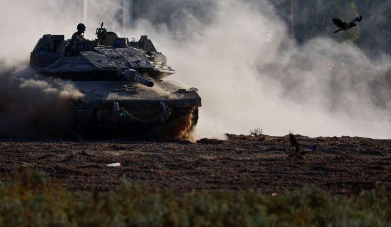Israeli tank manouvers near the Israel-Gaza border, in Israel