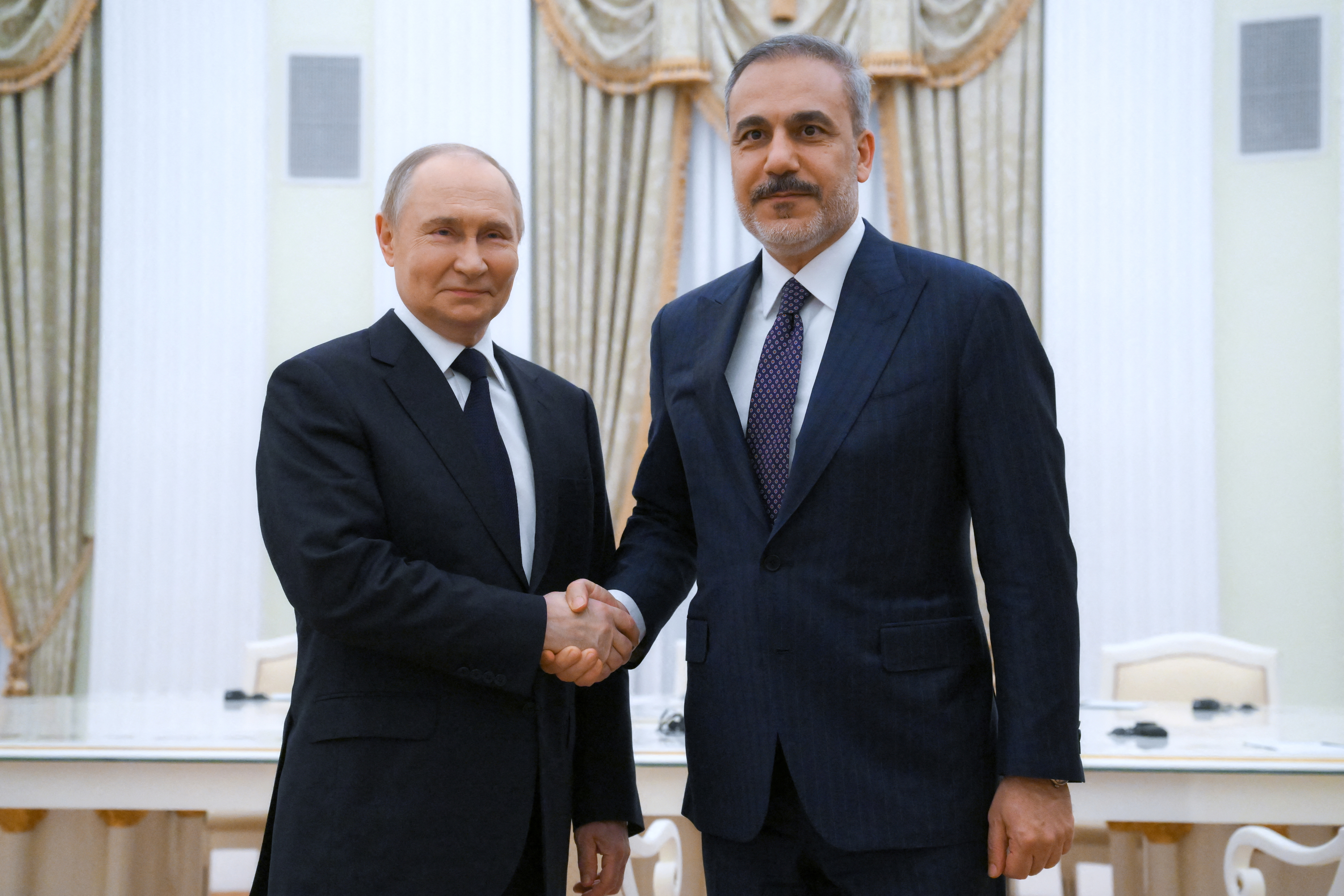 Russian President Vladimir Putin meets with Turkish Foreign Minister Hakan Fidan in Moscow