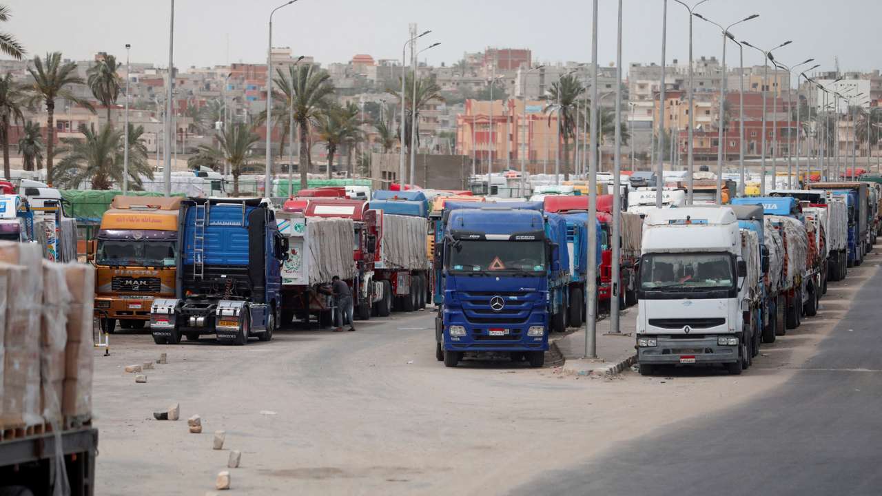 FILE PHOTO: Trucks stand at the Rafah border crossing between Egypt and the Gaza Strip