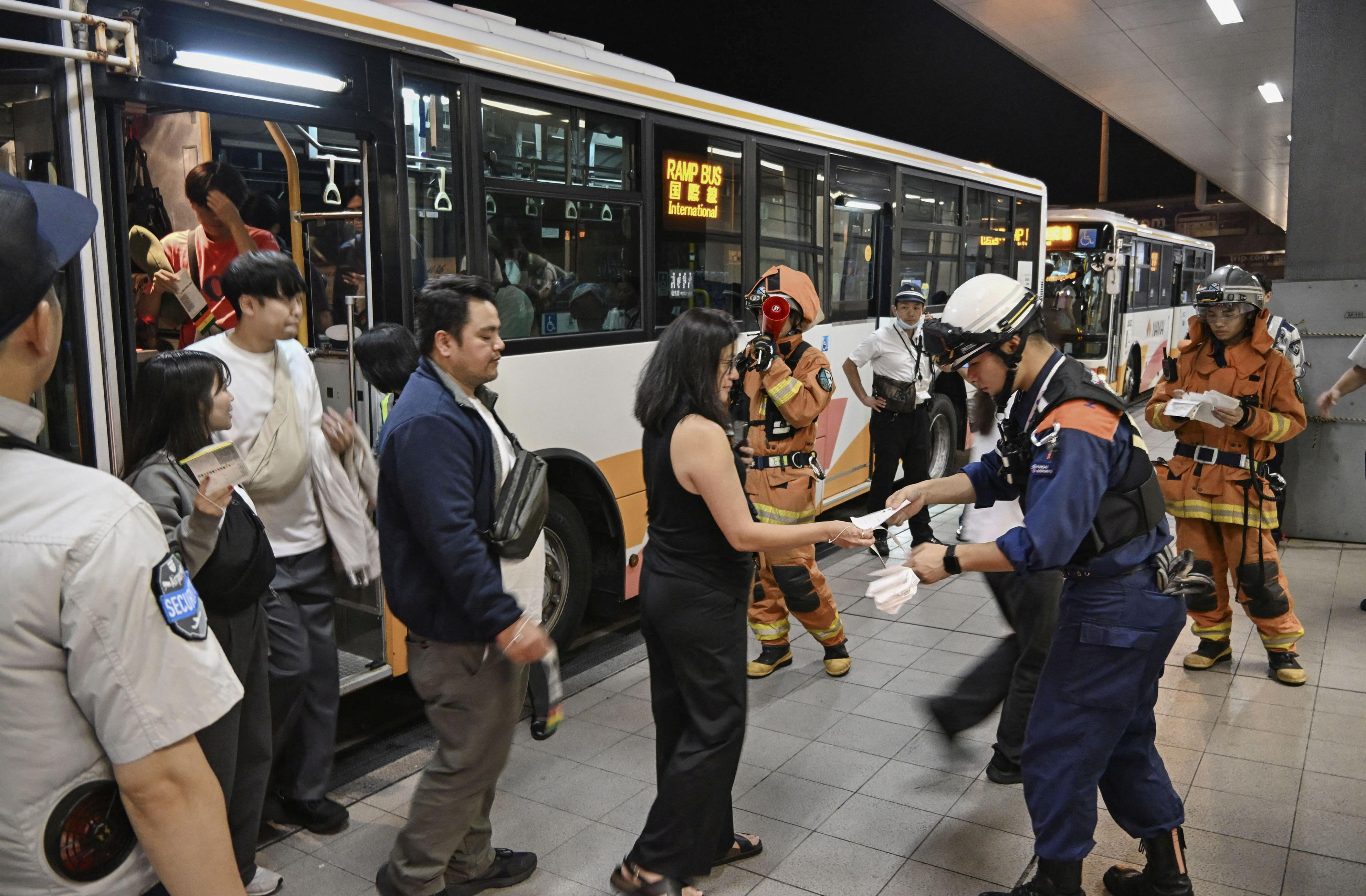 United Airlines flight passengers make emergency exit in Japan