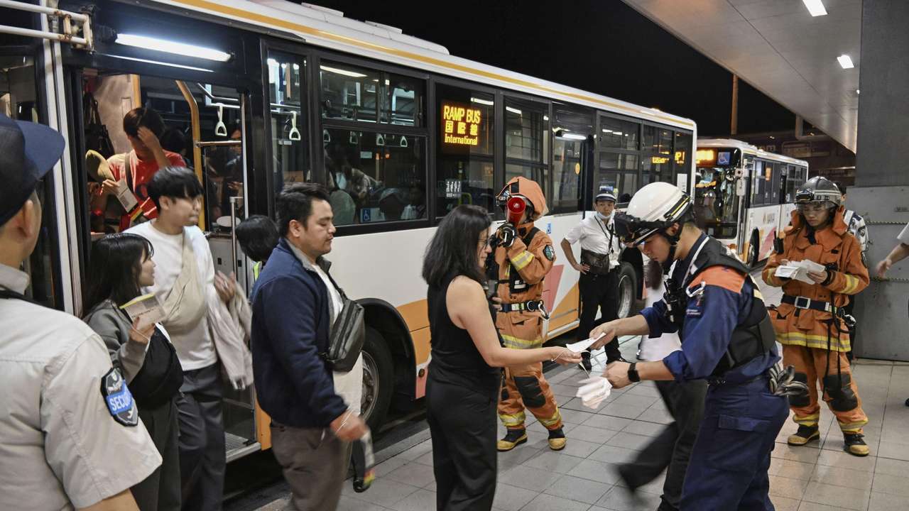 United Airlines flight passengers make emergency exit in Japan
