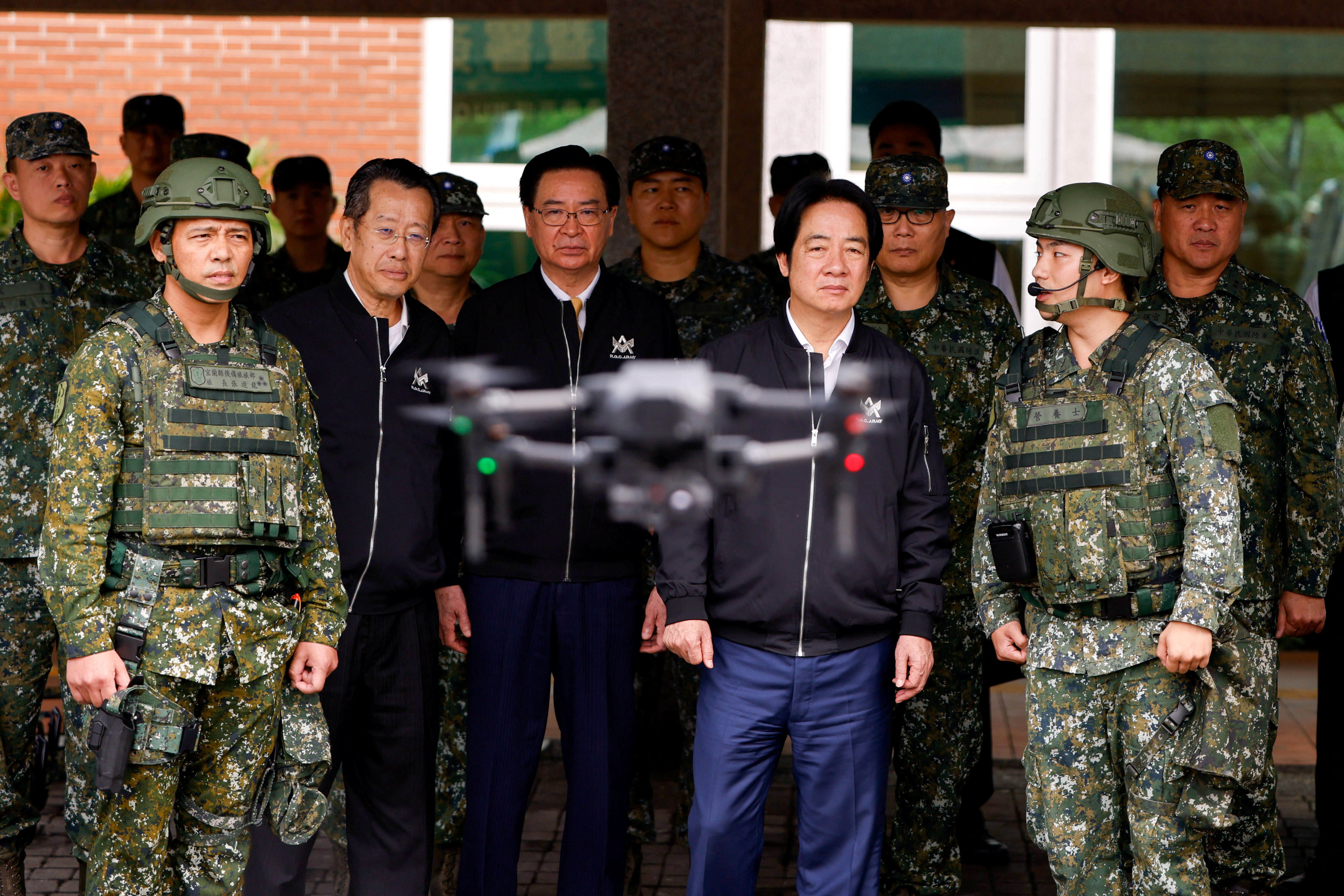Taiwan President Lai Ching-te  inspects reservists operating a Taiwan made Hummer 2 Drone during a training session at Loung Te Industrial Parks Service Center in Yilan