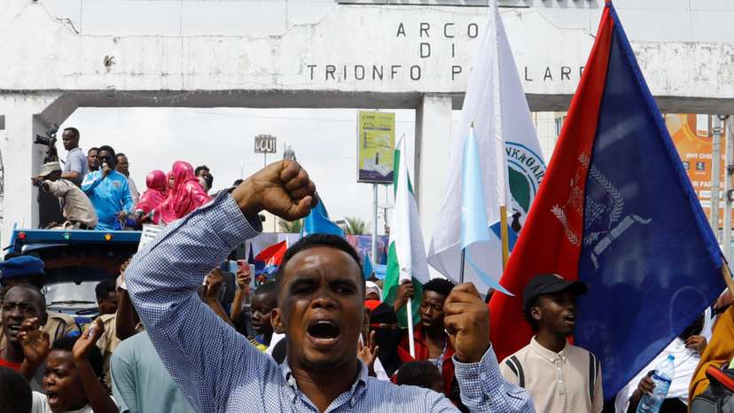 A Somali man reacts during a march against the Ethiopia-Somaliland port deal along KM4 street in Mogadishu