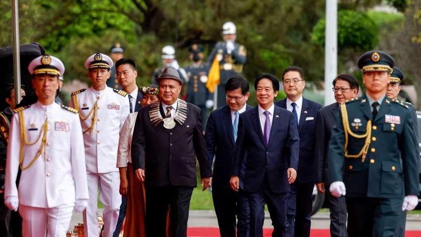 Taiwan President Lai Ching-te welcomes Tuvalu Prime Minister Feleti Teo in front of the presidential office in Taipei